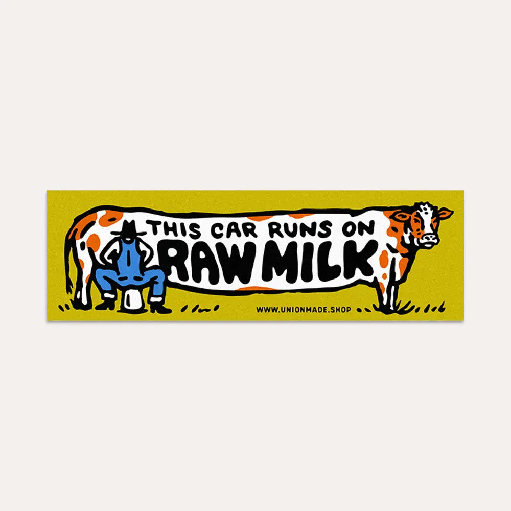 Union Made "This Car Runs On Raw Milk" bumper sticker with cow and person on stool, perfect for farm vehicle or dairy promotion.