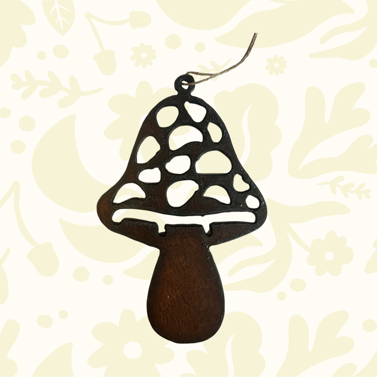 Universal Ironworks dark brown iron mushroom hanging decoration with stylish cut-outs, perfect garden ornament or outdoor decor.