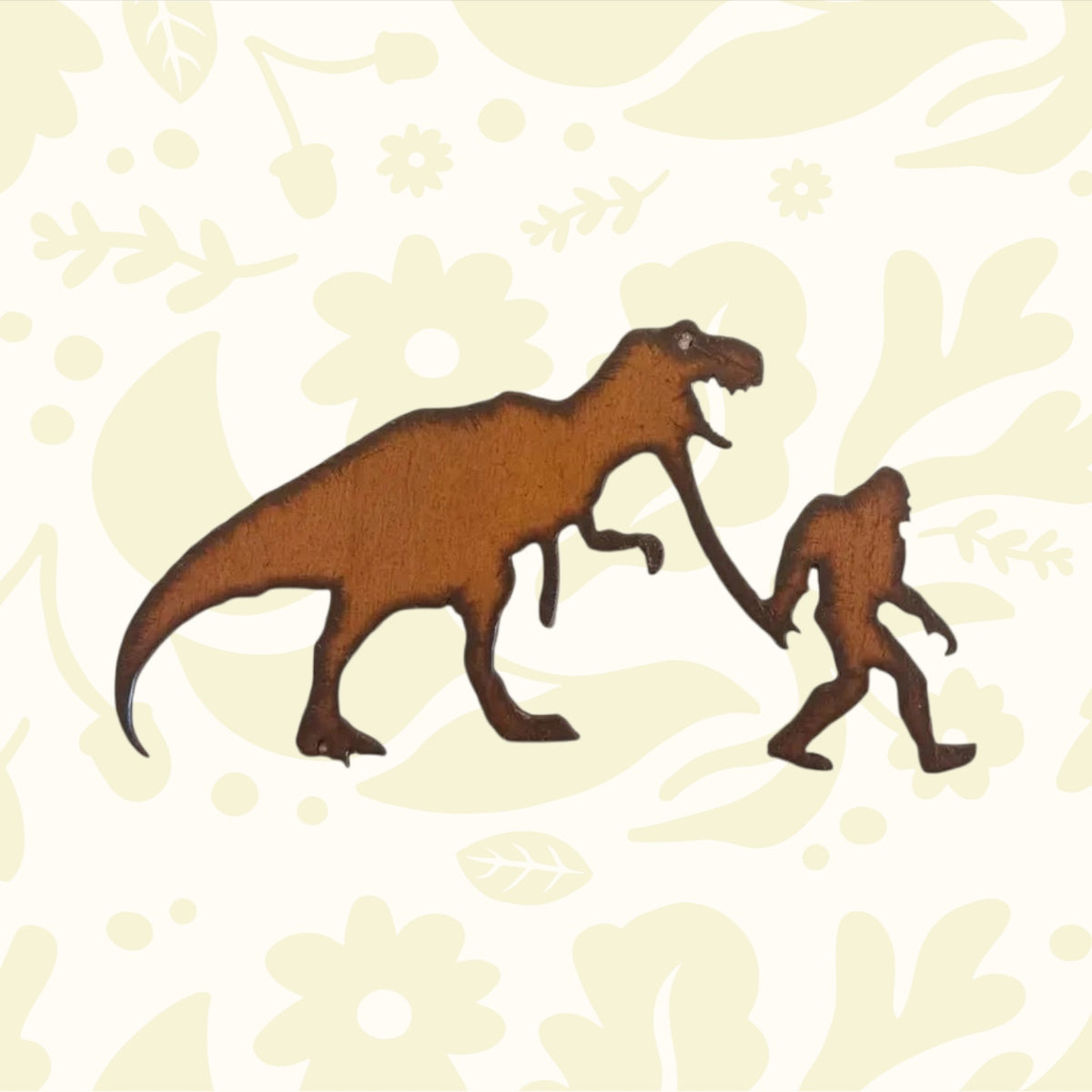 Metallic dinosaur and human figure on a white surface