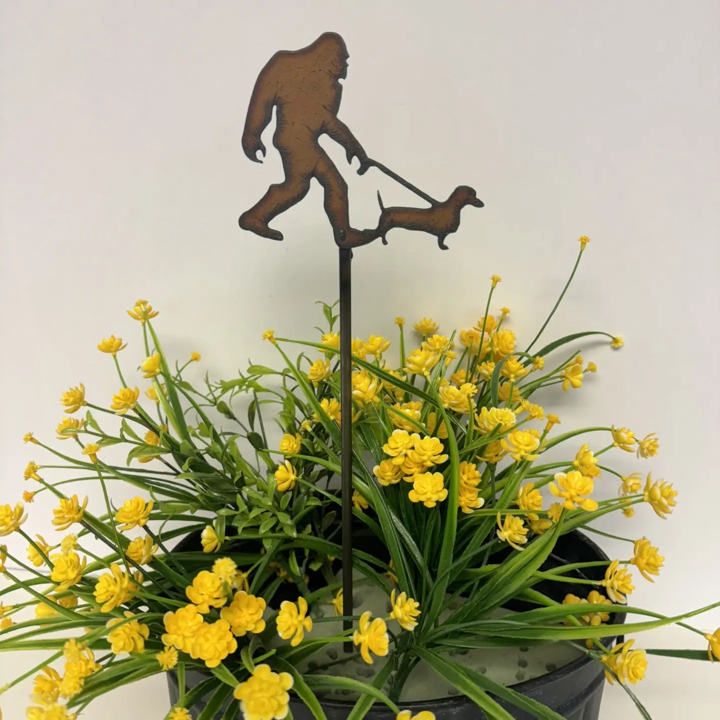 Universal Ironworks USA Bigfoot with Dachshund Plant Stake