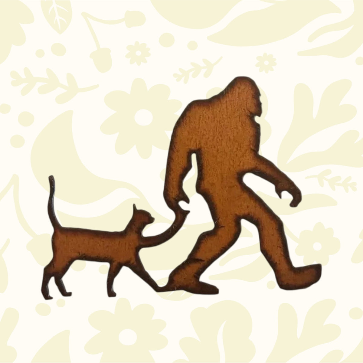 Universal Ironworks Bigfoot with Cat rustic metal magnet silhouette on white, unique forest home decor, collectible art gift.