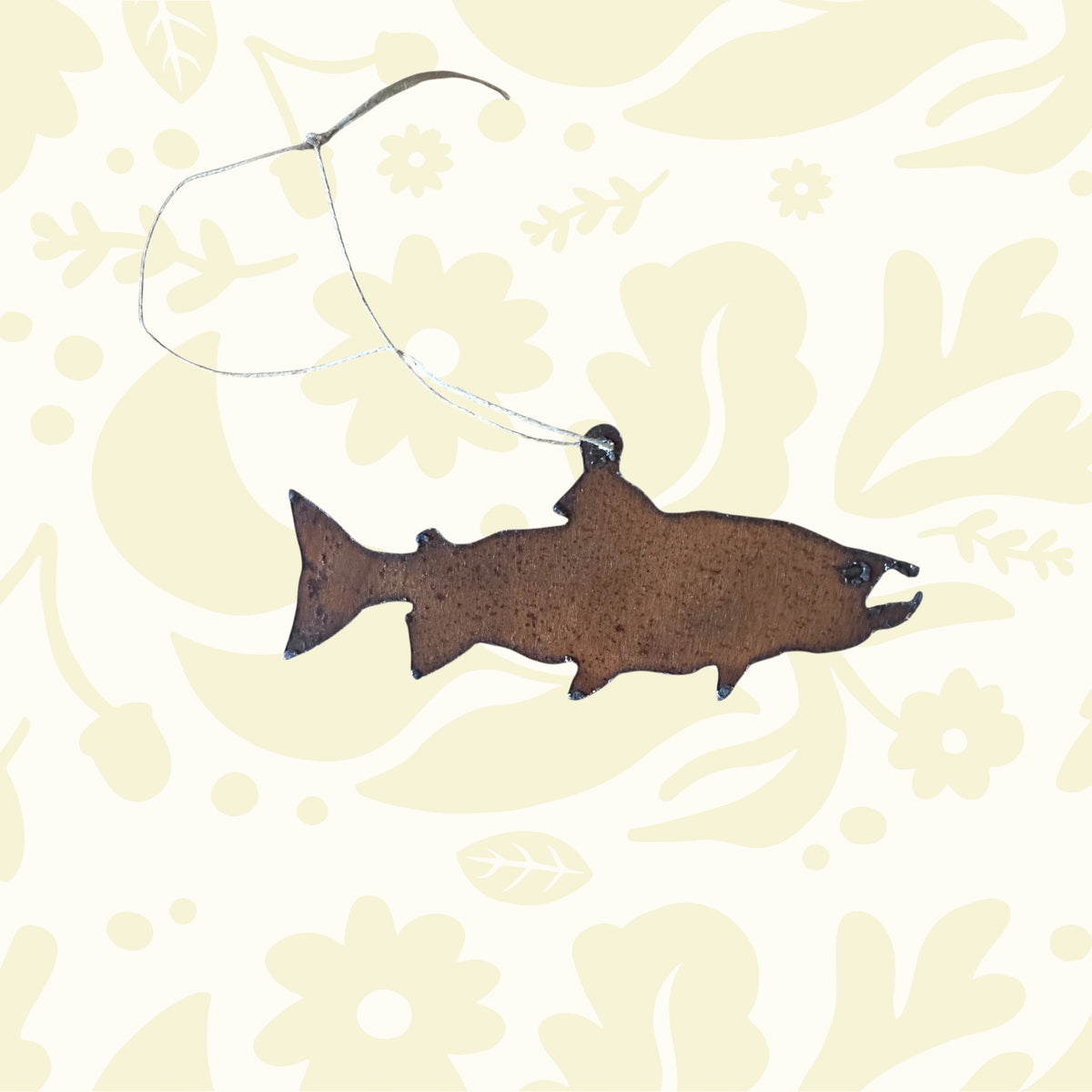Universal Ironworks USA salmon metal hanging decoration, rustic brown fish design, white string, perfect wall art by Universal Ironworks.