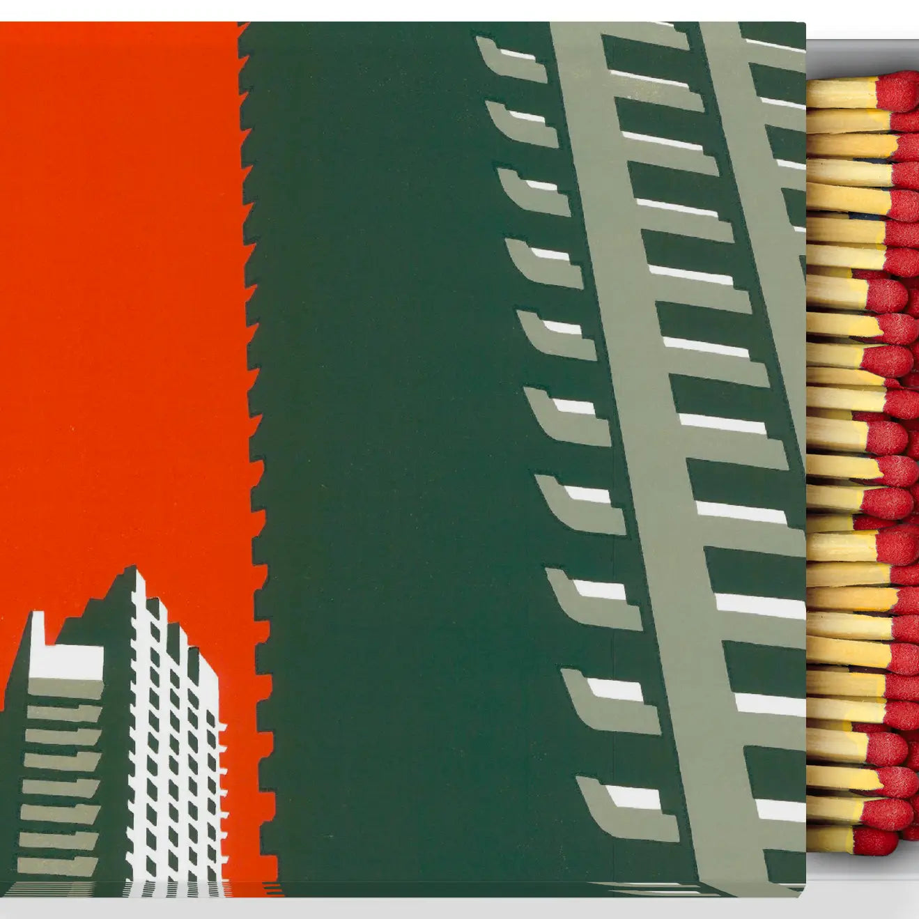 A box of matches called "Blue Crow Media Modernist Matchbox Barbican Estate," featuring an illustration by Paul Catherall, showcases modernist matchboxes inspired by 20th-century architecture. The cover displays a striking building, with some matches partially pulled out.