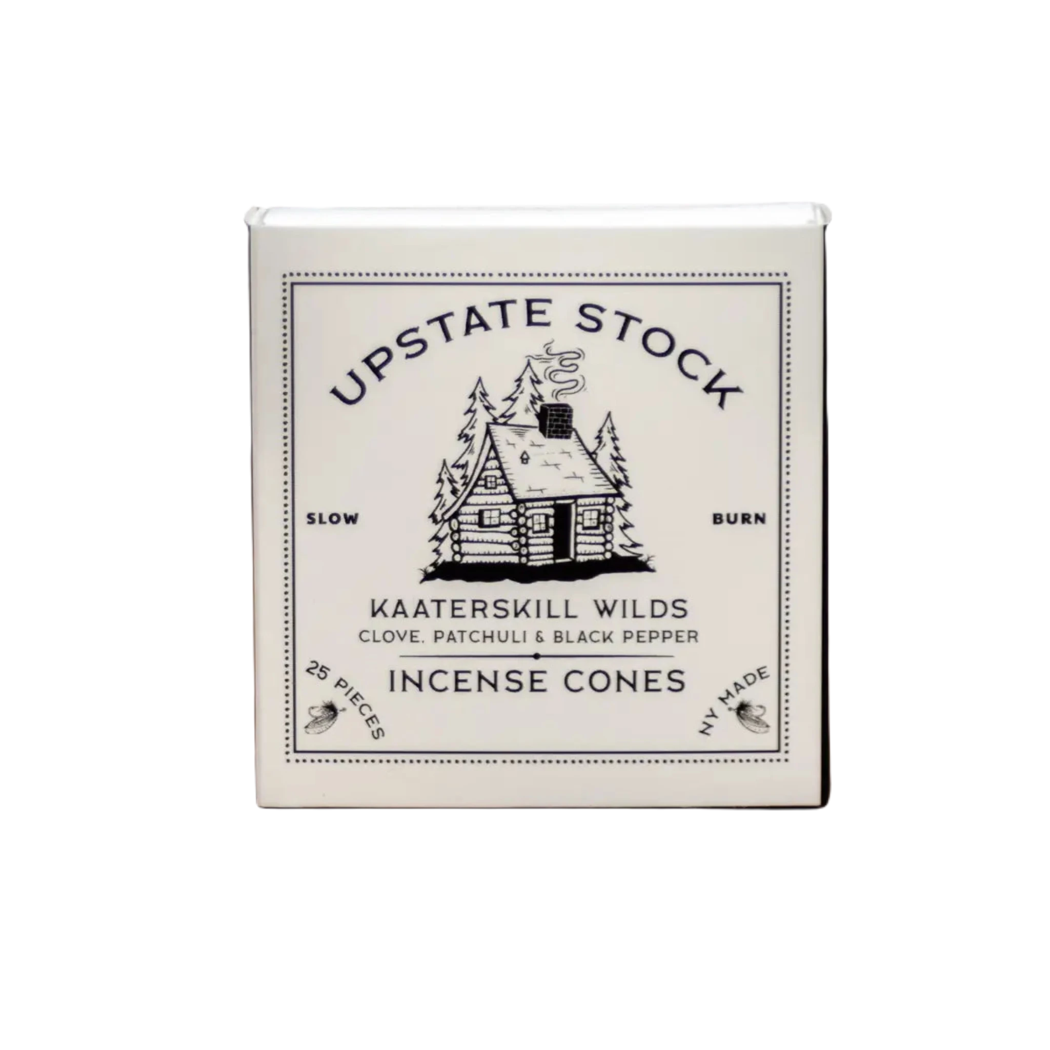 A box of Upstate Stock Kaaterskill Wilds Incense Cones, adorned with a charming cabin illustration and labeled "slow burn" and "clove, patchouli & black pepper," is enhanced with eugenia caryophyllata for a rich aromatic experience.