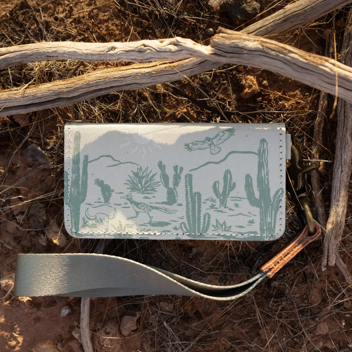 Forager Provisions LTD Wildtree card holder with western landscape print, featuring a wrist strap and silver D-ring.