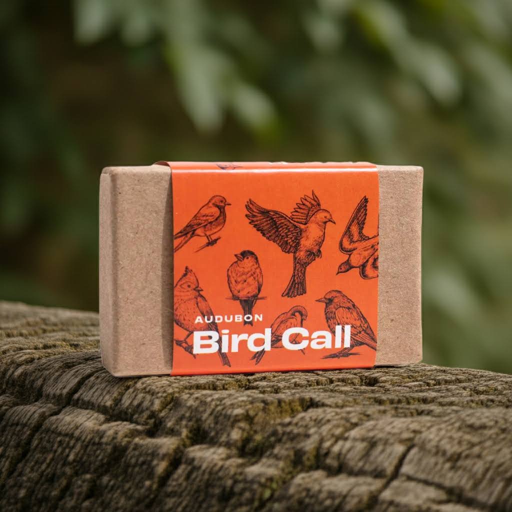 Stemcell Audubon Bird Call by Stemcell Science Shop, outdoors with bird illustrations—unique birding gift for nature lovers.