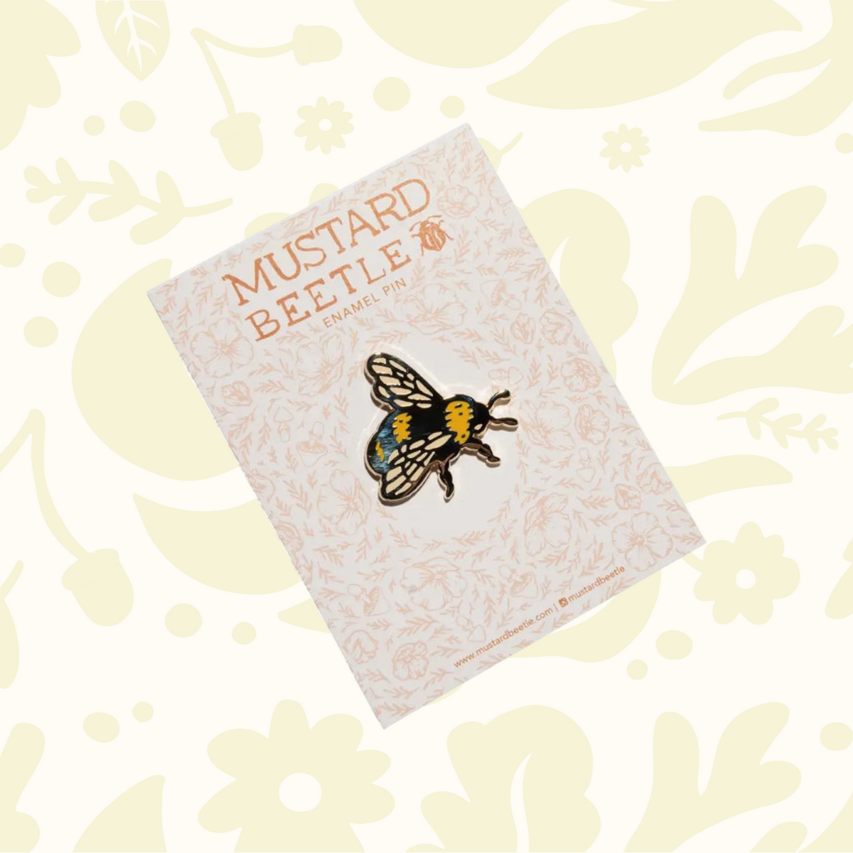Forager Provisions LTD Mustard Beetle bee hard enamel pin with mirrored finish on a decorative backing card