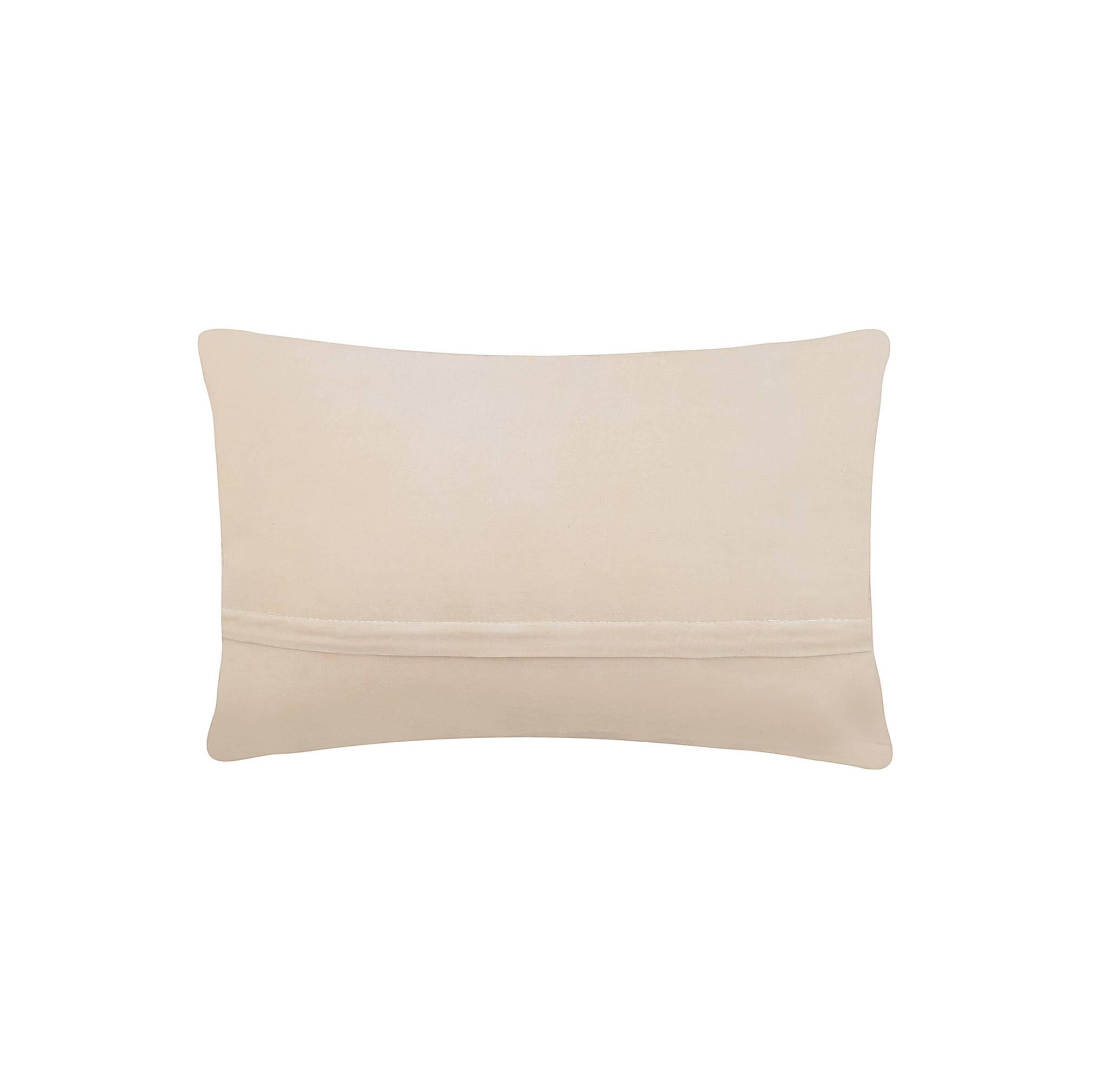 Forager Provisions LTD 8x12 lumbar pillow with a solid beige velvet back and hidden zipper closure.