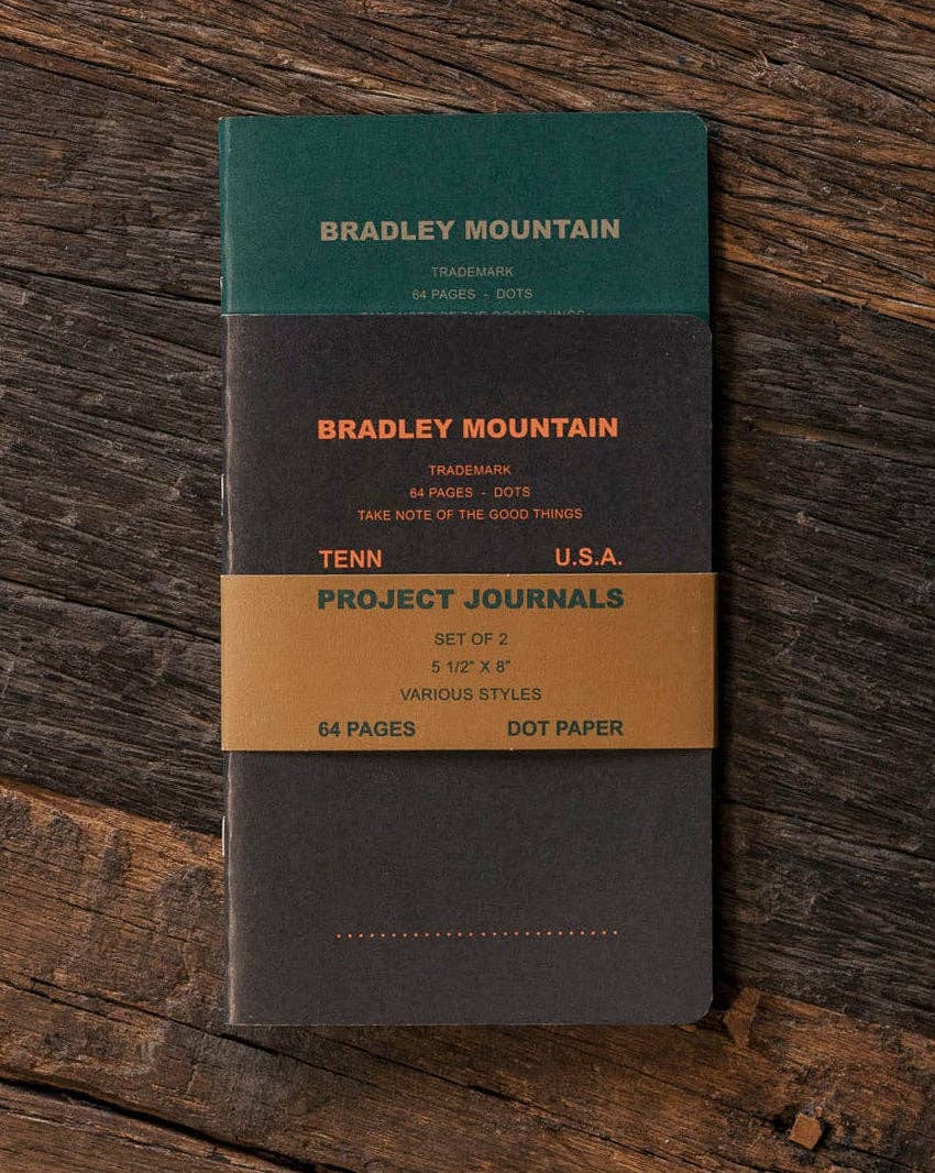 Forager Provisions LTD Bradley Mountain 2-pack of large vintage-style dot grid project journals on a wooden surface