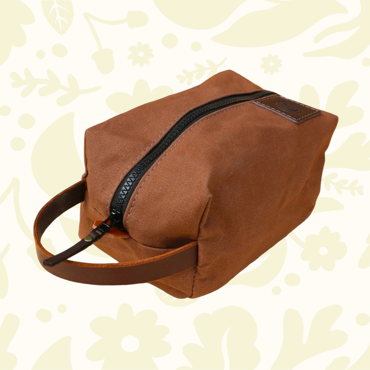Forager Provisions LTD Journeyman Handcraft medium brown heavy-duty cotton canvas toiletry bag with a sturdy grab loop.