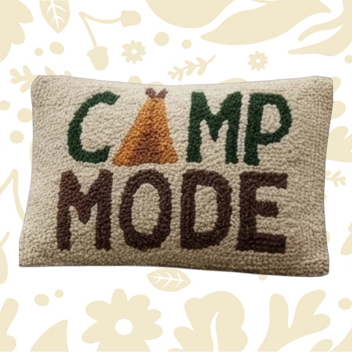 Forager Provisions LTD Camp Mode wool hooked cushion on a plaid blanket in front of a canvas tent in the woods.