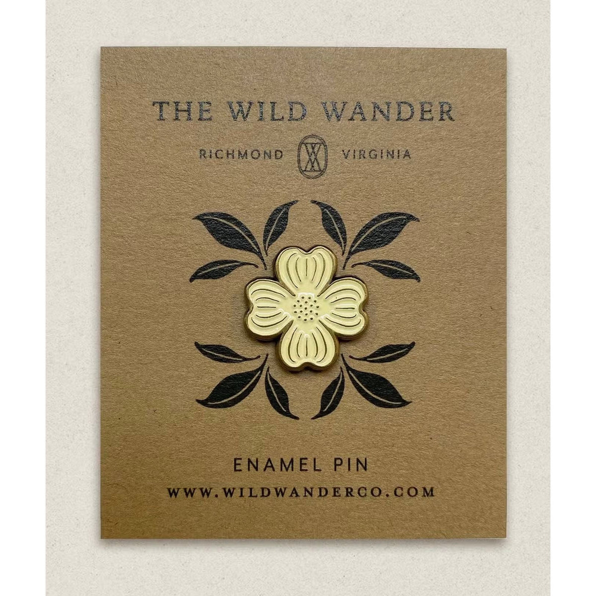 Forager Provisions LTD ivory and antique gold dogwood flower enamel pin on an illustrated kraft backing card.