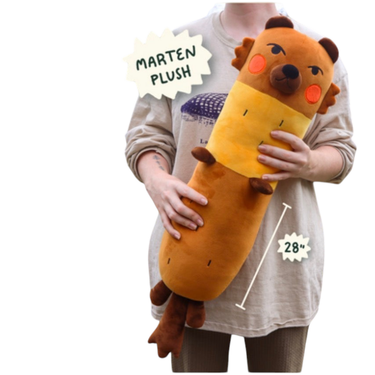 Forager Provisions LTD 28-inch European Marten plush toy with soft brown and yellow fur held by a person.
