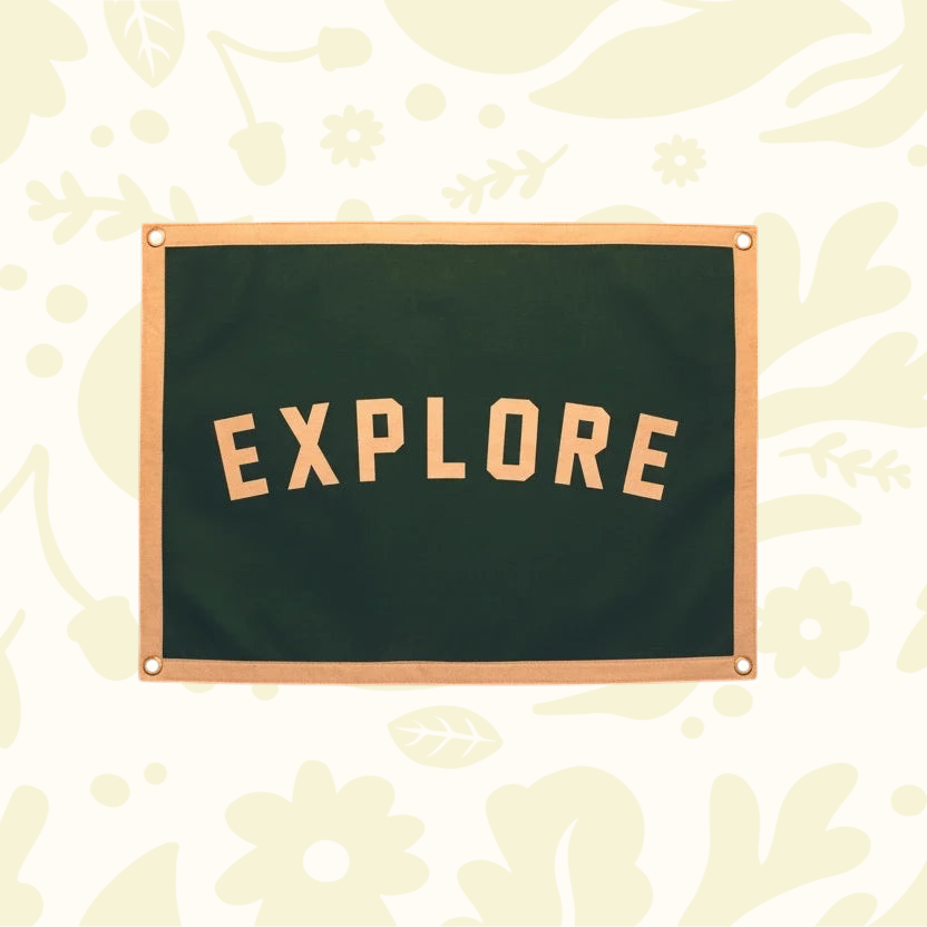 Forager Provisions LTD Oxford Pennant EXPLORE camp banner in dark green wool felt with tan trim and metal grommets.