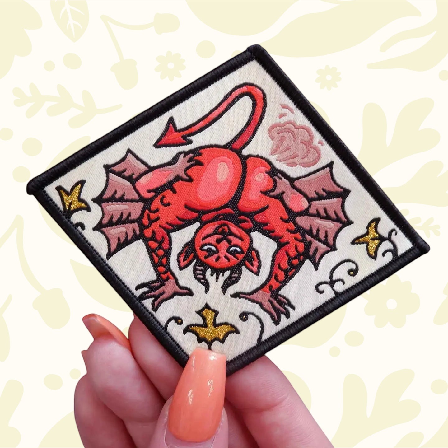 Forager Provisions LTD Cat Coven Fart Demon iron-on embroidered patch with a red devil character on a diamond shape.