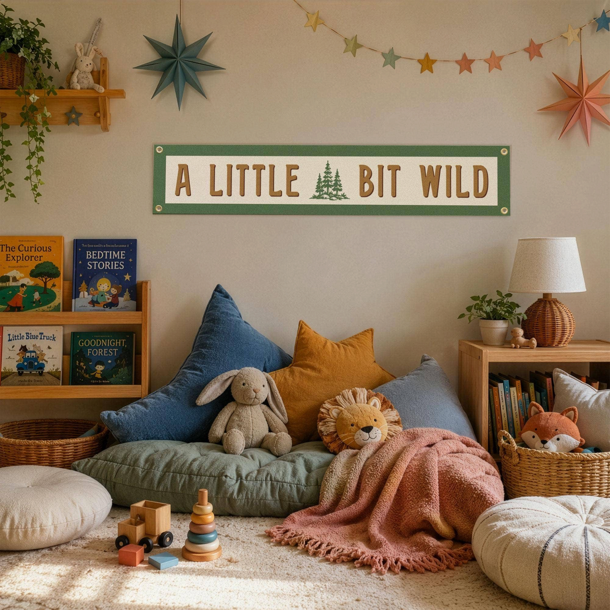 Forager Provisions LTD Benoit's Design Co. A Little Bit Wild felt wall banner hanging in a cozy children's playroom.