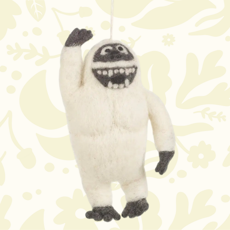 Forager Provisions LTD handmade felt yeti hanging decoration in white wool with grey details and a hanging loop.