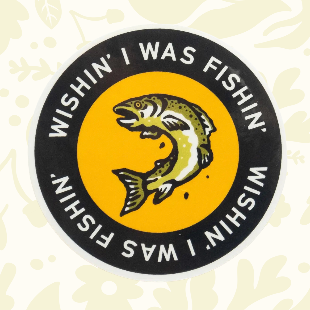 Forager Provisions LTD round vinyl sticker featuring a jumping fish and the text Wishin I Was Fishin on a yellow background