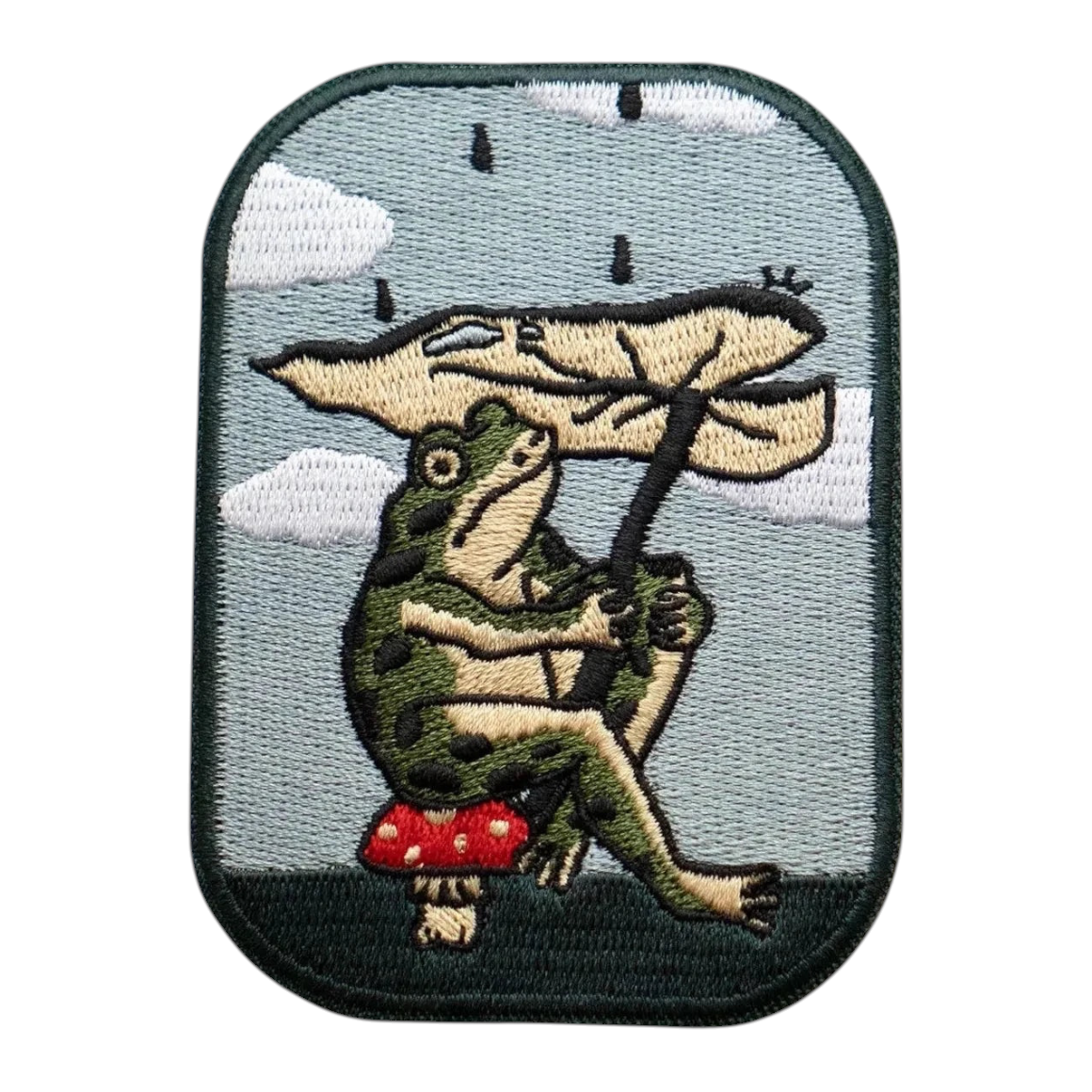 Stay Home Club Leaf Umbrella Frog Patch: Frog with leaf sits on red mushroom, rainy sky background. Unique enamel frog patch.