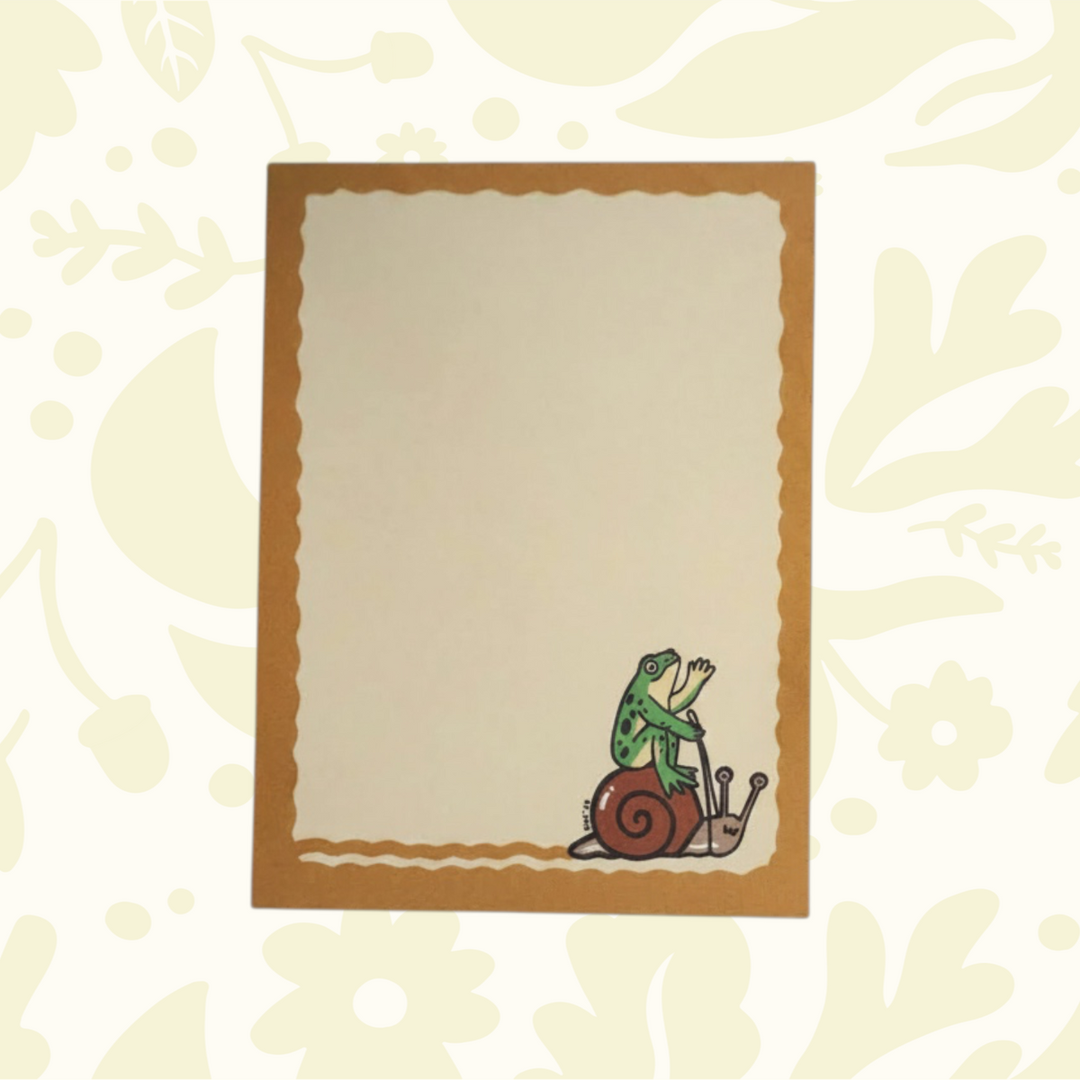 Forager Provisions LTD Stay Home Club notepad featuring a whimsical frog riding a snail illustration on a scalloped border