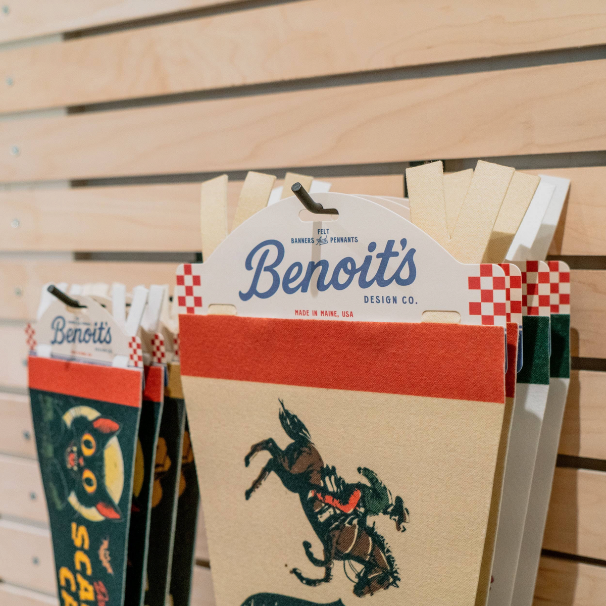 Forager Provisions LTD Benoit's Supply Co. vintage style felt pennant with Gone Fishin' design on a wooden display