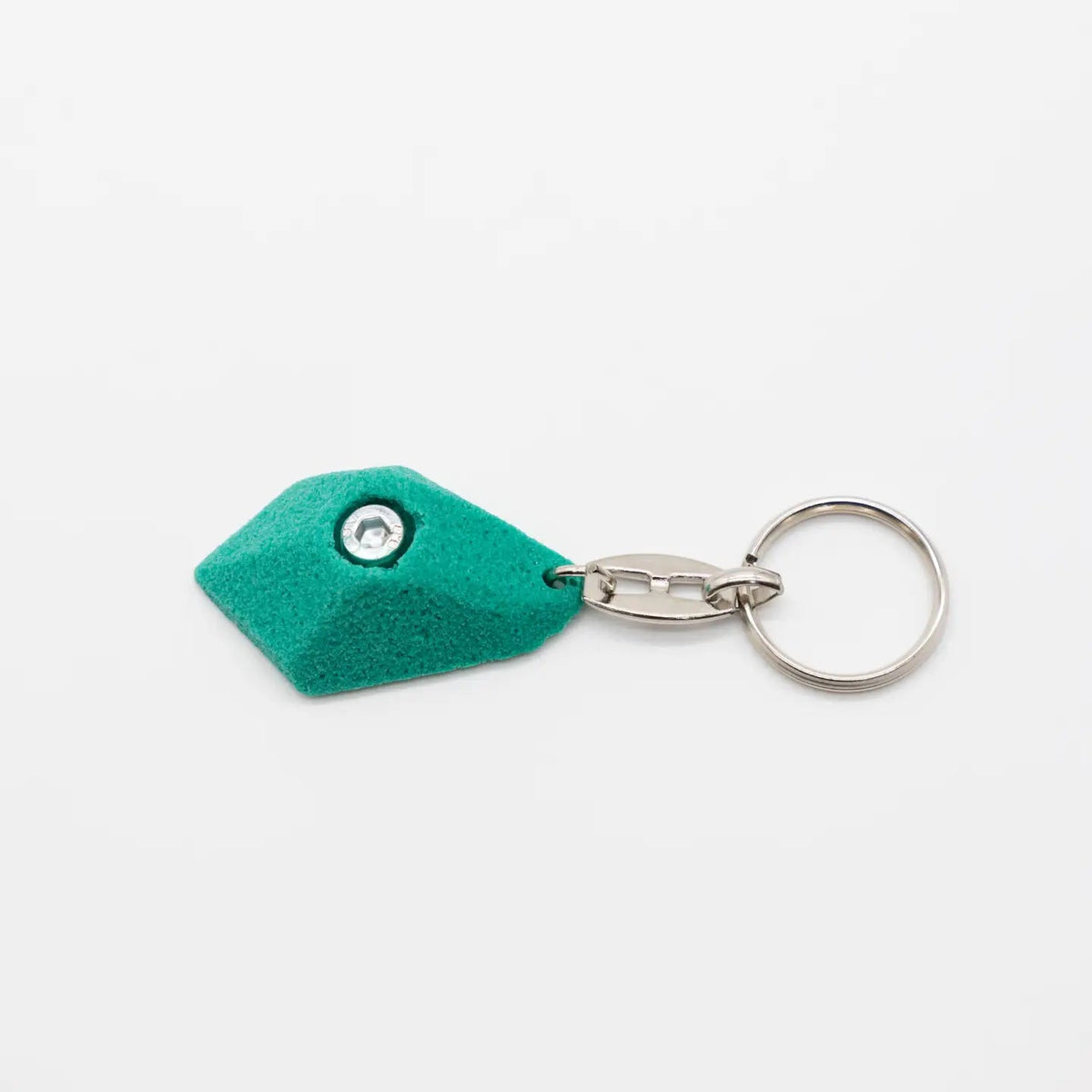 Forager Provisions LTD Seven Peaks green climbing hold keychain with a metal split ring on a white background.
