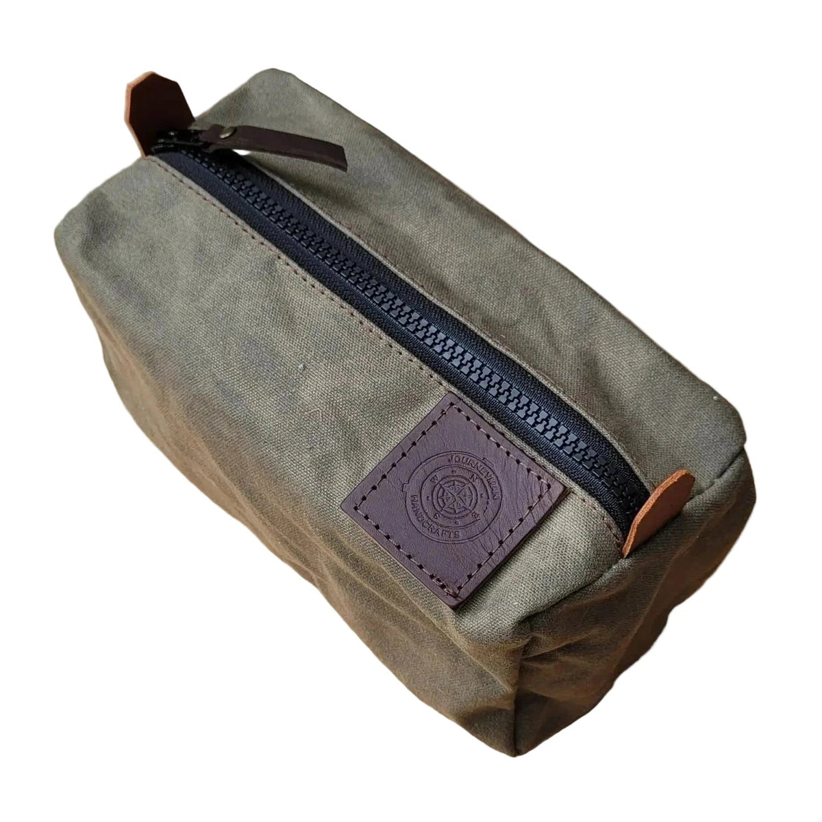 Forager Provisions LTD Journeyman Craft green waxed canvas camping peg case with a durable YKK zipper and leather logo