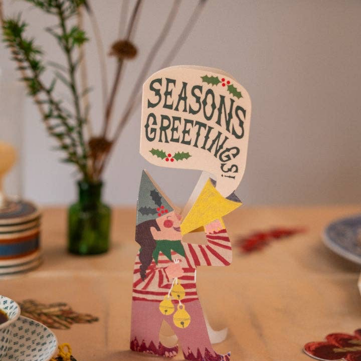 Forager Provisions LTD Hadley Christmas greeting card featuring a whimsical illustrated elf girl holding a megaphone