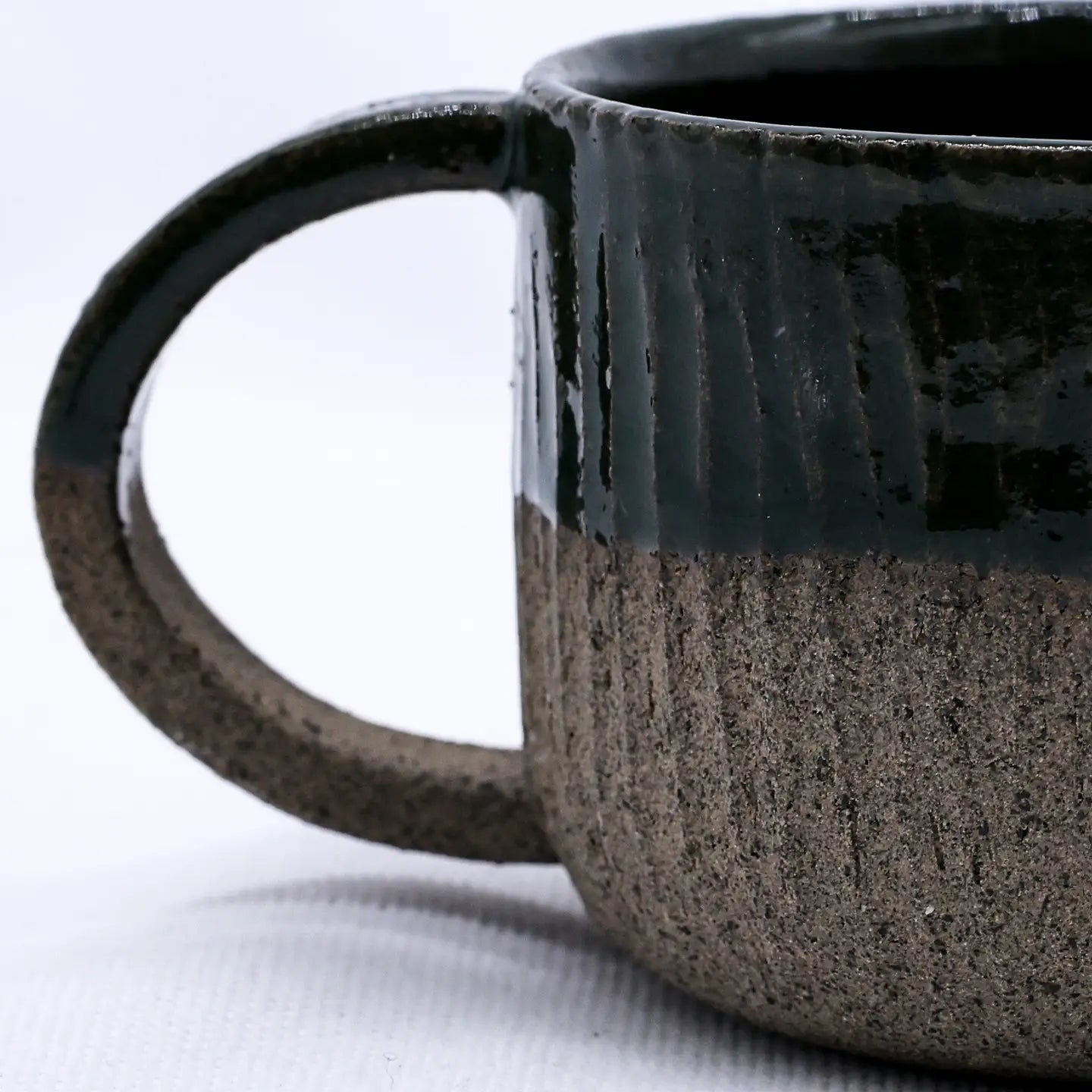 Forager Provisions LTD Ribera Bluverde Arte handmade stoneware mug in smoked grey with a textured, glazed finish.