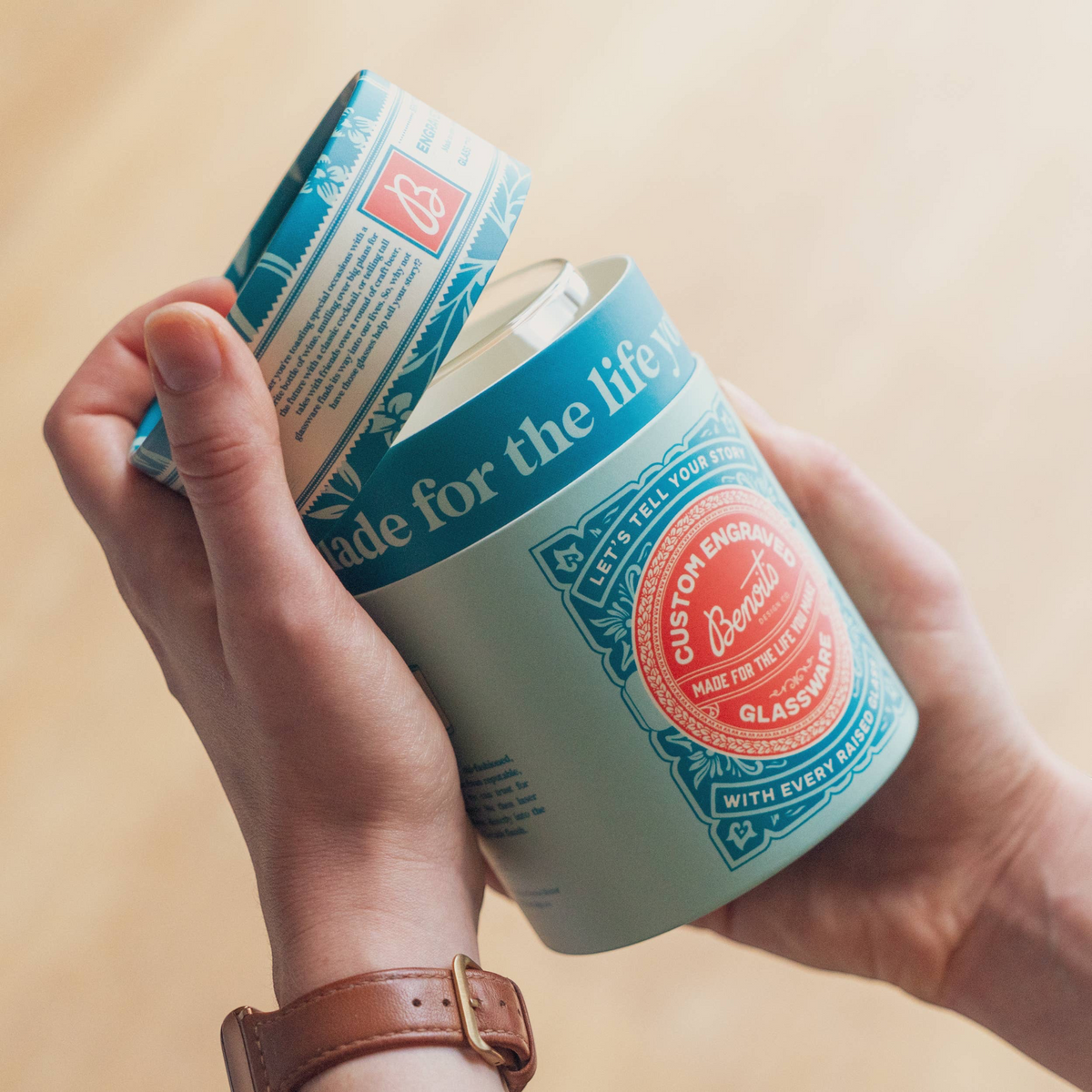 Forager Provisions LTD Benoit’s Design Co. Krampus beer can glass in branded packaging held by a person