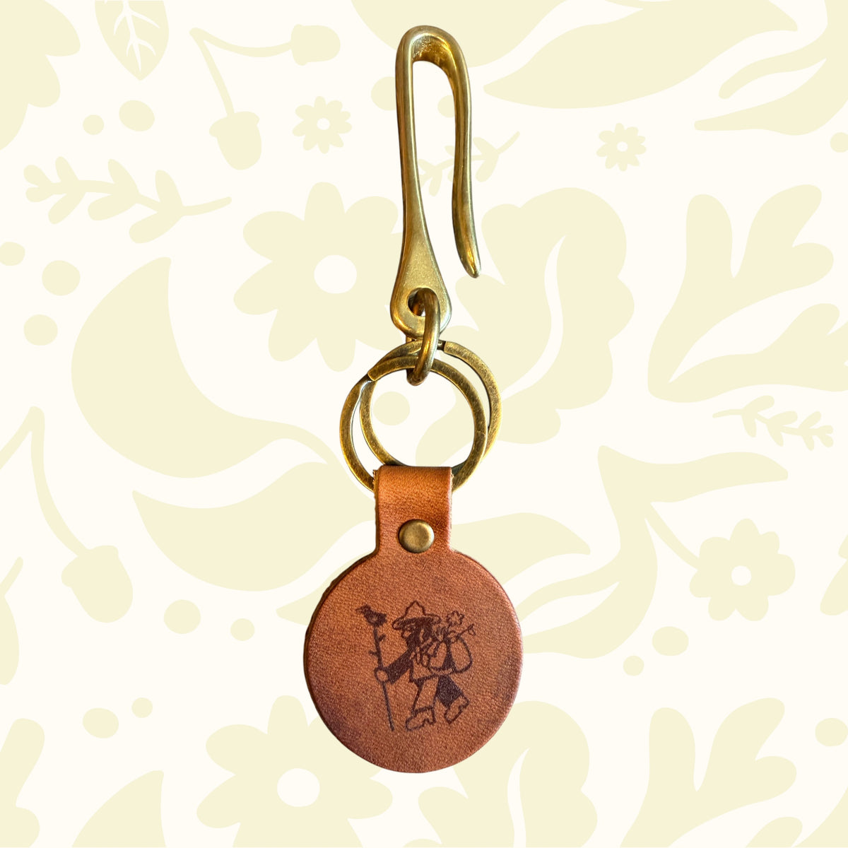 Forager Provisions LTD leather fish hook key fob in natural Horween leather with solid brass hardware and D-rings.