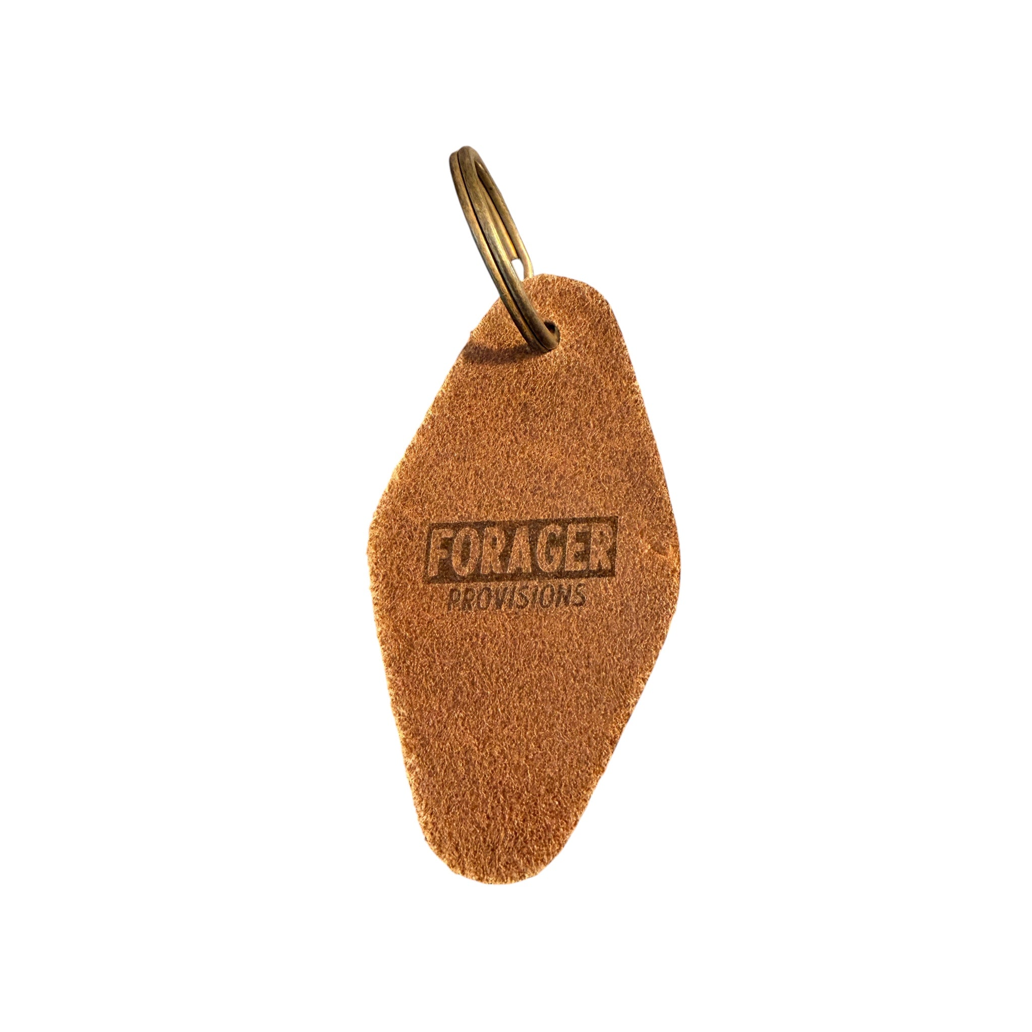 Forager Provisions LTD leather motel-style keyring with embossed branding on a textured stone surface.
