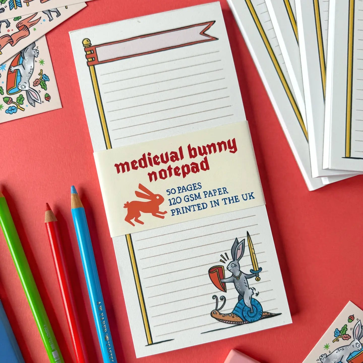 Forager Provisions LTD notepad featuring a medieval illustration of a rabbit knight riding a snail on a lined page.