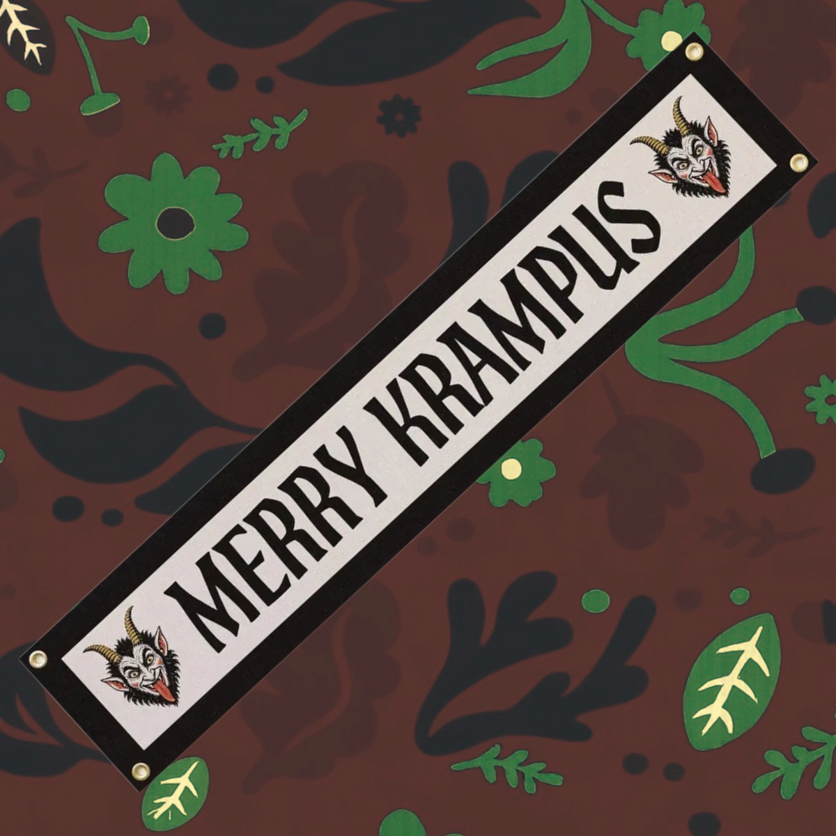 Forager Provisions LTD Merry Krampus felt pennant banner with vintage-style folklore illustration on a dark background.
