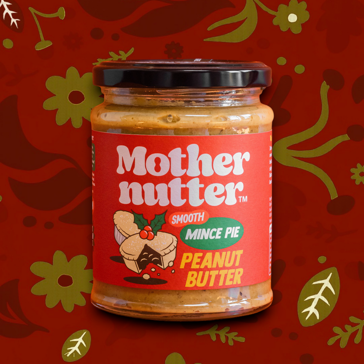 Forager Provisions LTD Mothernutter smooth mince pie flavoured peanut butter in a glass jar with festive red label.