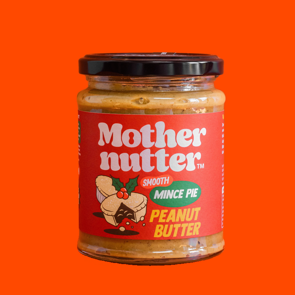 Forager Provisions LTD Mothernutter smooth mince pie flavoured peanut butter in a glass jar with a red label.