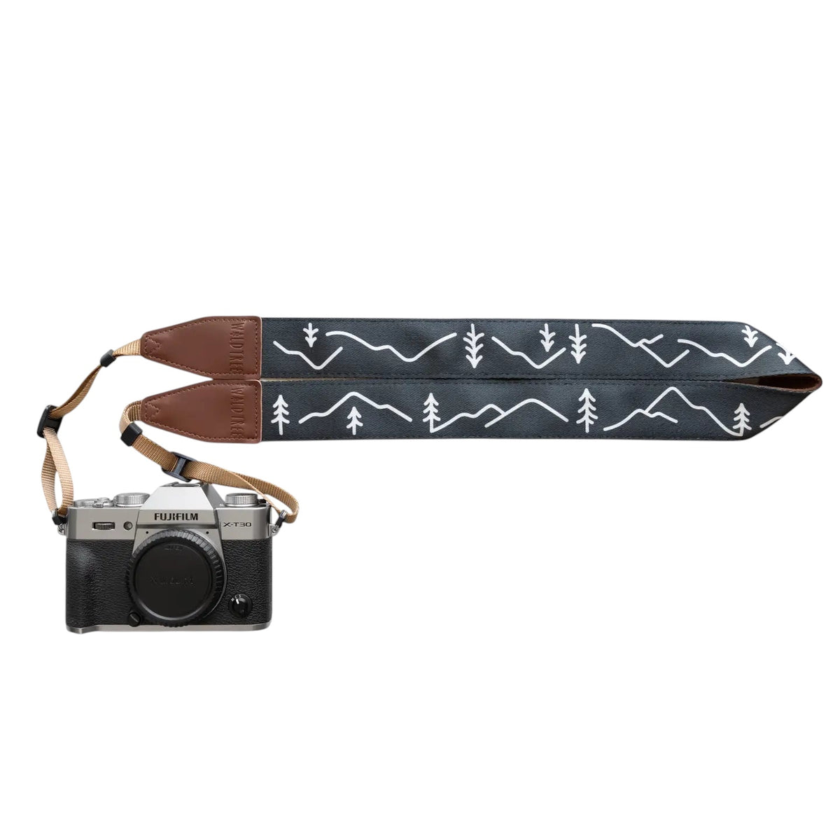 Forager Provisions LTD Wildtree camera strap featuring a black mountain and pine tree pattern with brown faux leather