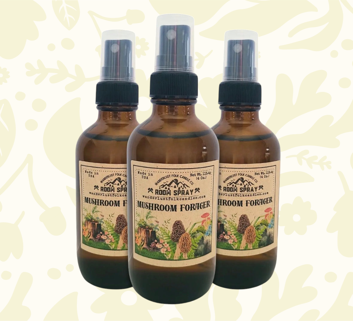 Forager Provisions LTD Wanderlust Folk The Mushroom Forager room spray bottles on a wooden log in a forest setting.