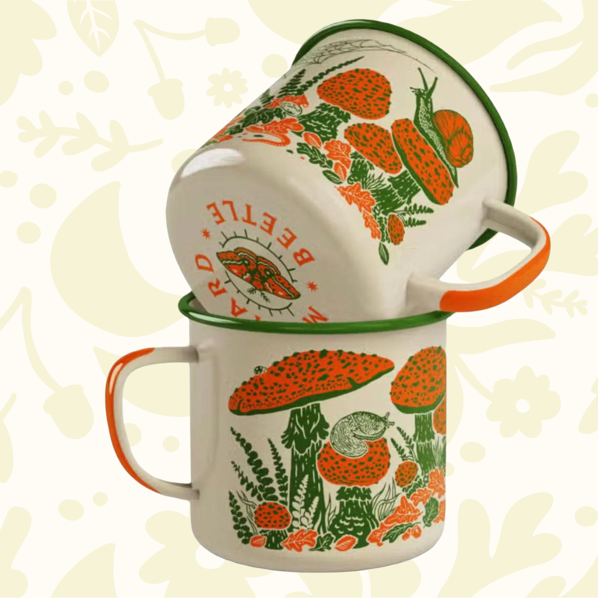 Forager Provisions LTD Mustard Beetle cream enamel camp mugs stacked with toad and mushroom woodland illustrations.