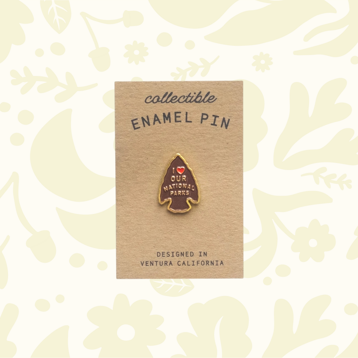 Forager Provisions LTD National Parks arrowhead enamel pin on a branded cardboard backing card.
