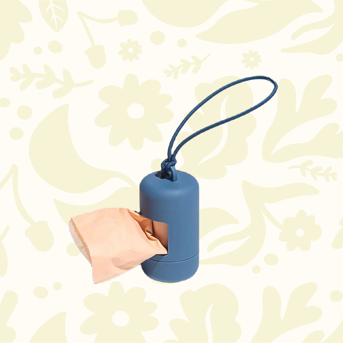 Wild One Navy Poop Bag Holder with looped strap plus expired bags, pictured on a floral background; pet accessory must-have.