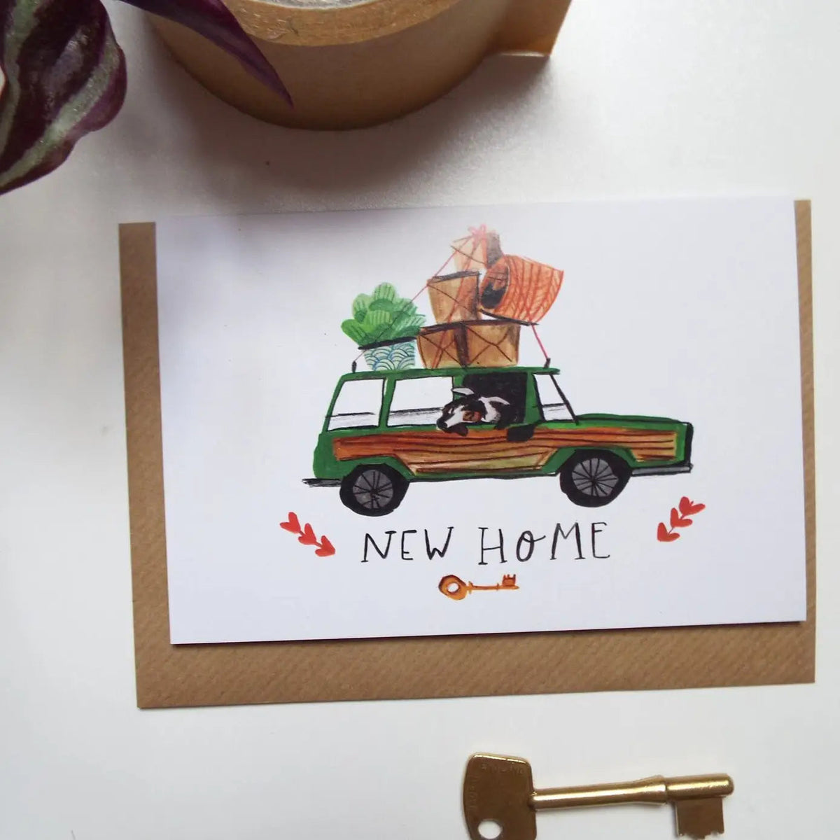 Forager Provisions LTD greeting card featuring a Dick Vincent illustration of a car packed with boxes for a new home.