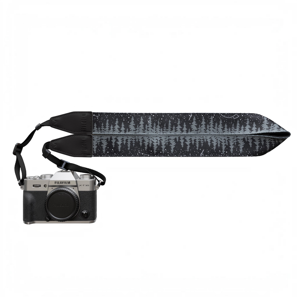 Forager Provisions LTD Wildtree Night Sky camera strap with a black forest and star pattern attached to a silver camera