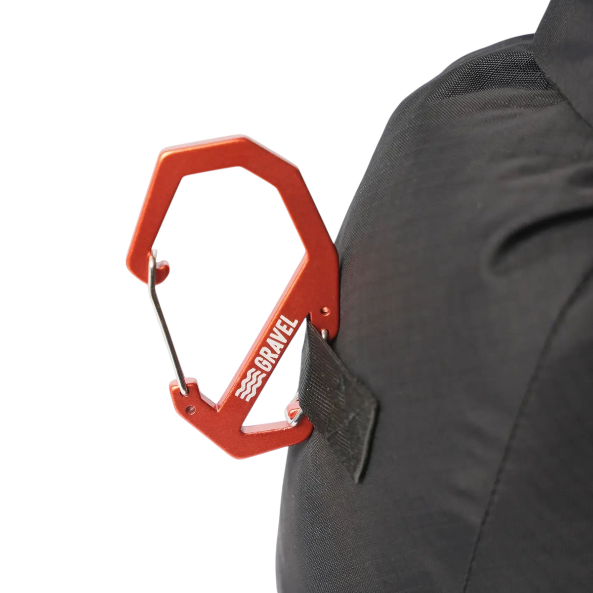 Forager Provisions LTD orange Gravel double-gated aluminum carabiner clipped to a black gear bag strap