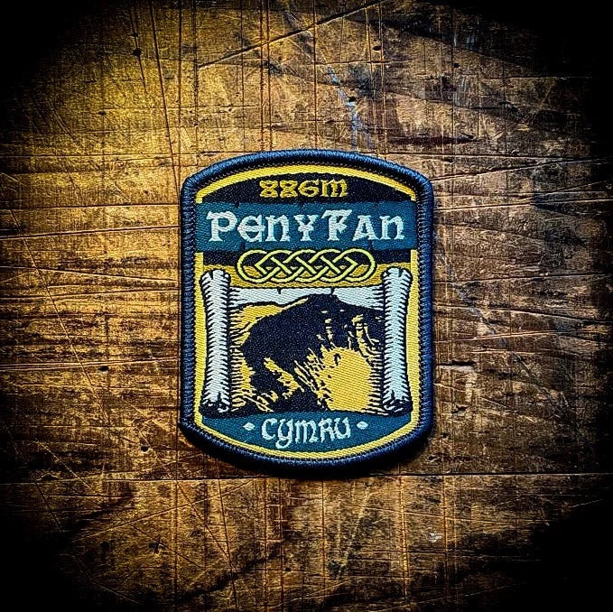 Forager Provisions LTD Pen y Fan embroidered patch featuring a mountain design on a rustic wooden background