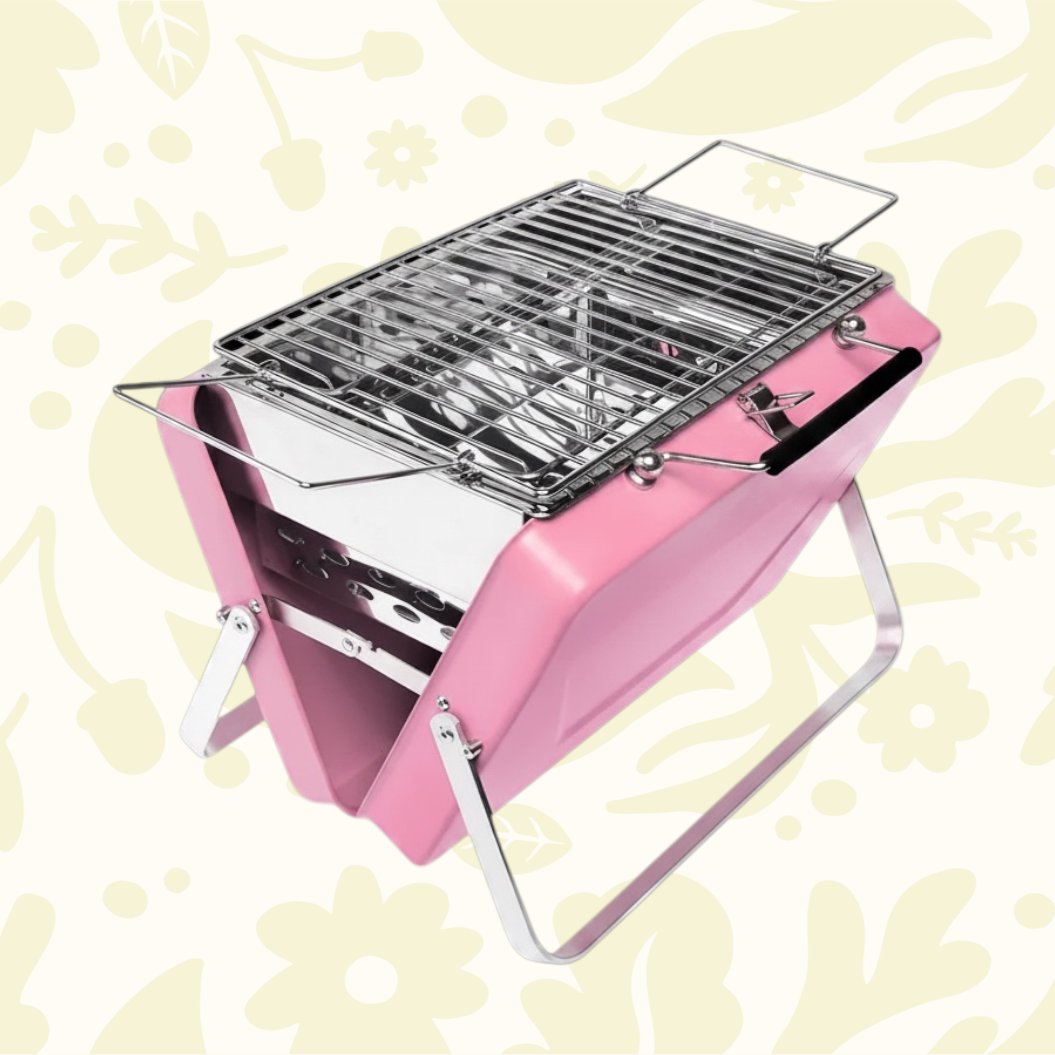 Forager Provisions LTD Rex portable pink suitcase charcoal BBQ grill with metal cooking grate and folding stand