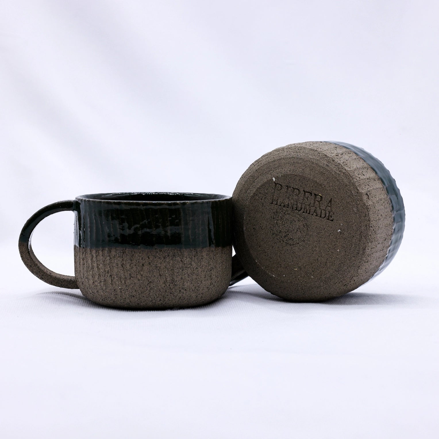 Forager Provisions LTD Ribera handmade smoked grey stoneware mug with a textured base and smooth glazed rim.
