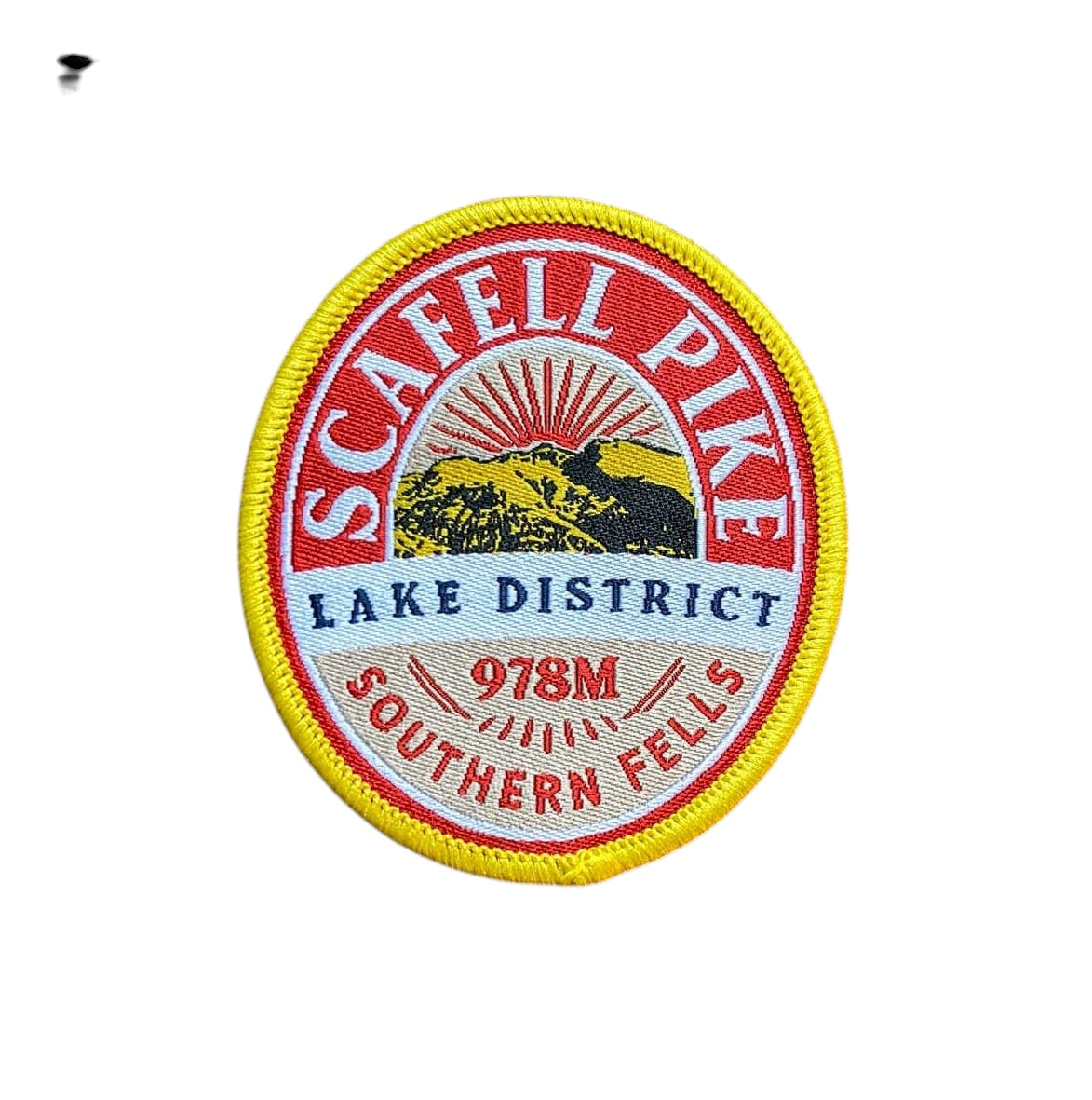 Forager Provisions LTD embroidered Scafell Pike patch featuring a mountain landscape design on a rustic wood surface.