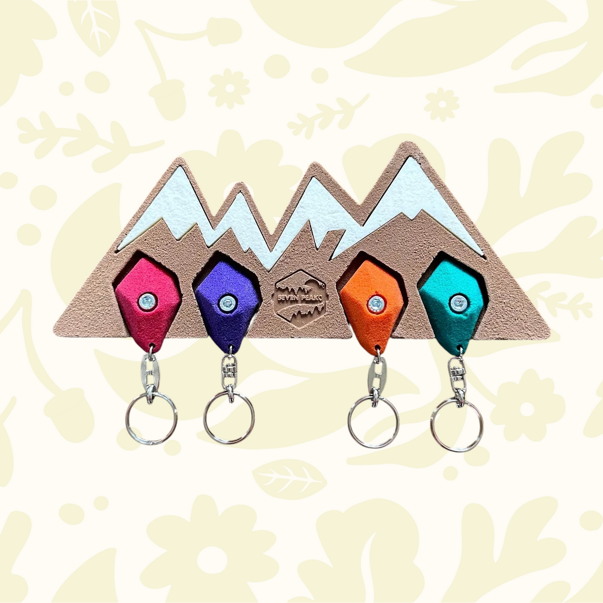 Forager Provisions LTD Seven Peaks mountain-shaped resin key holder with four colorful climbing hold keychains