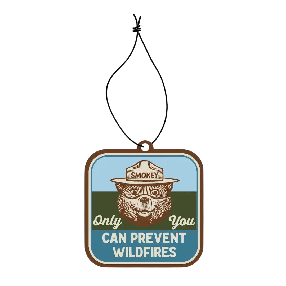 Forager Provisions LTD Smokey Bear hanging air freshener with evergreen and cypress scent and forest graphic